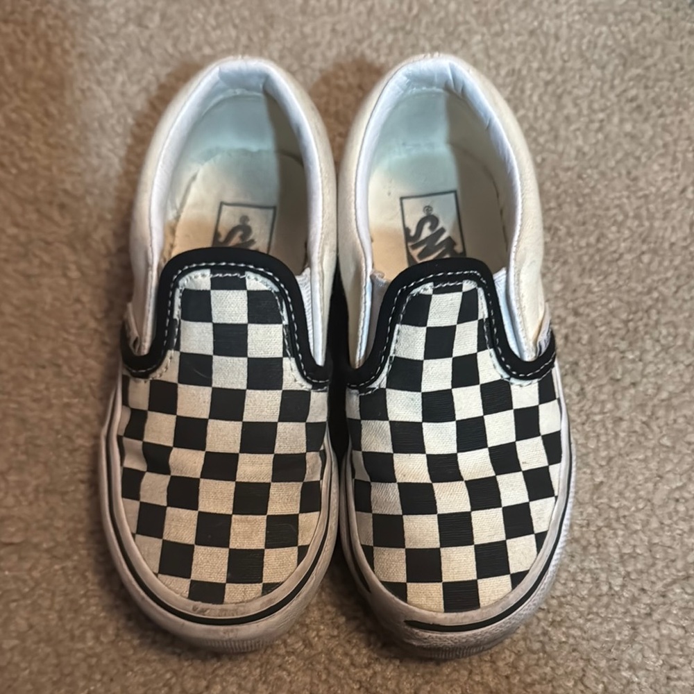 Vans Black and White Checkerboard Slip-On Sneakers